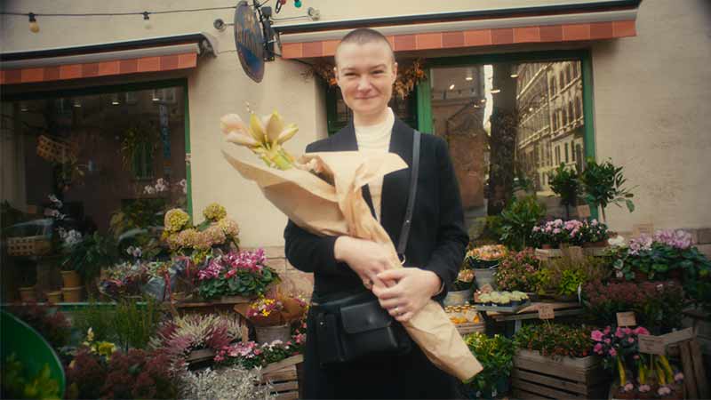 woman outside shop